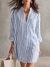 Women's striped shirt dress with three-quarter sleeves and button detailing.