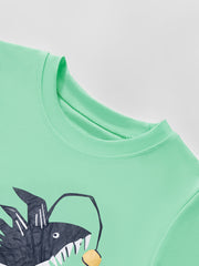 Close-up of the round neckline and stitching on the children's neon green t-shirt