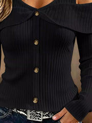 Close up of black cold shoulder ribbed knit top bodice showing ribbing and front buttons
