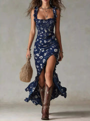 Navy blue floral smocked maxi dress with ruffle straps and high low hem