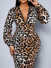 Close view of white leopard print bodice with lace trimmed V neck