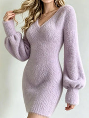 Lavender fuzzy knit sweater dress with V neck and long puff sleeves, angled front view