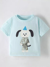 Mint blue children's short sleeve t-shirt with cartoon dog in patterned outfit, front flat view