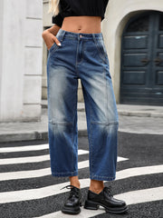 Women's wide-leg jeans with pockets in a slightly stretchy rayon blend.