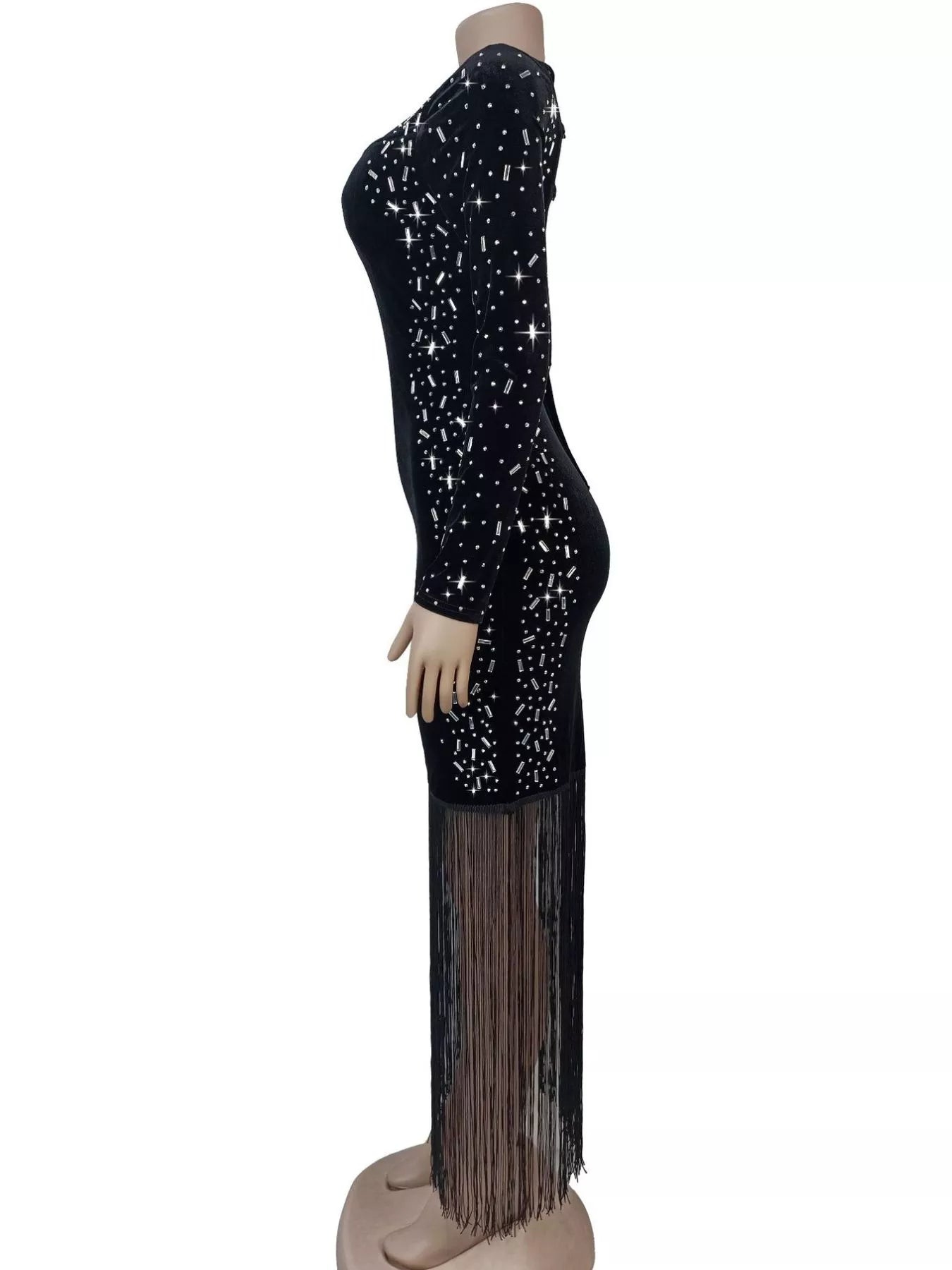 Side view of black asymmetrical dress on a mannequin showing rhinestone panel