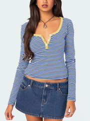 Royal blue and white striped long sleeve t shirt with pale yellow trim and white buttons front view