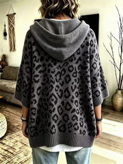 Back view of gray leopard print oversized hooded knit sweater with solid gray hood