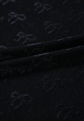 Top de manga larga con cuello redondo y lazo