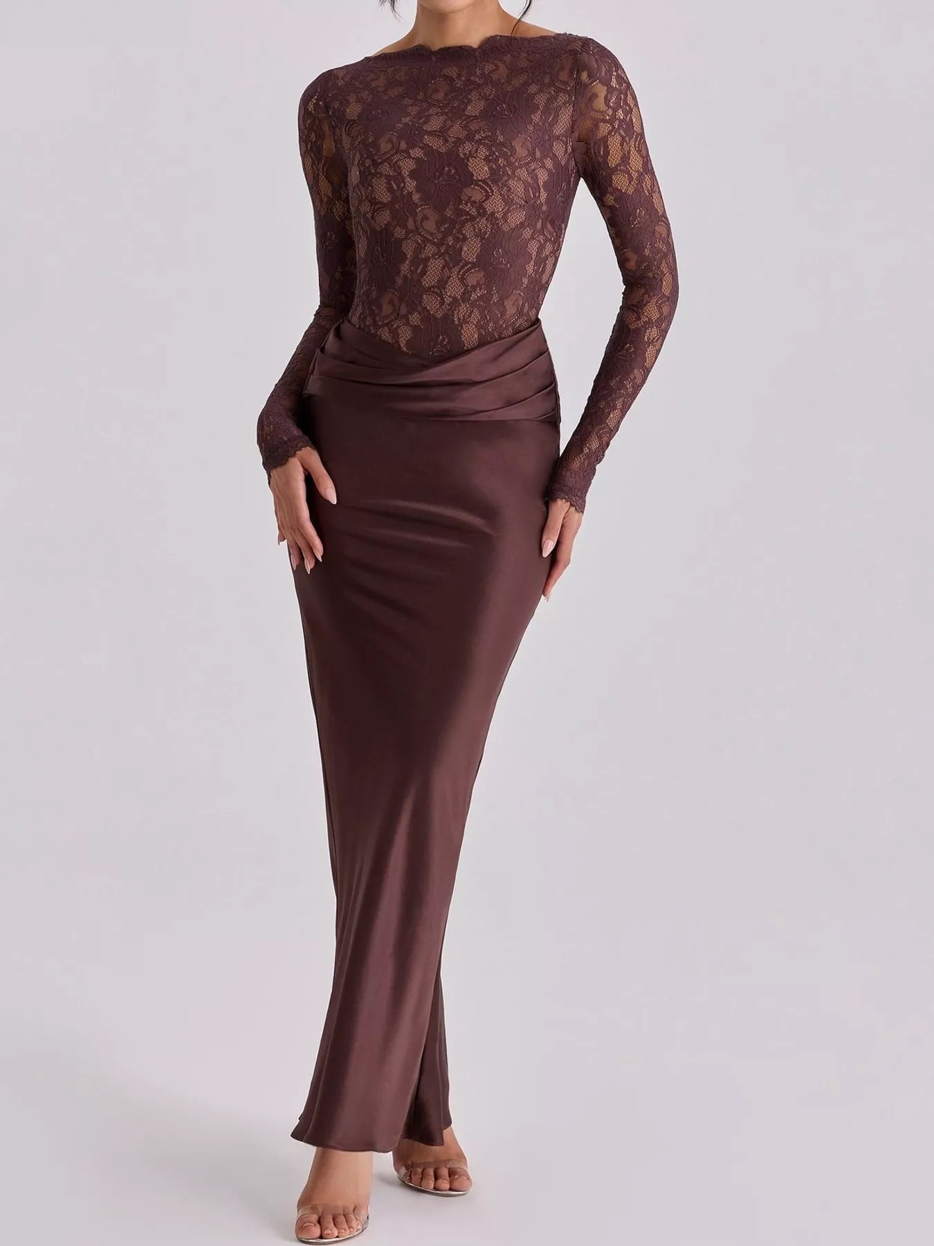 Front full length view of dark red lace bodice and satin maxi dress in studio