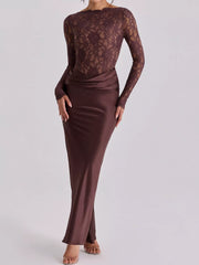 Front full length view of dark red lace bodice and satin maxi dress in studio