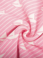 Suéter de manga larga con cuello redondo en contraste