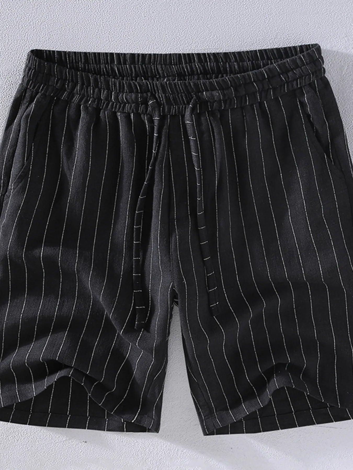 Men's black striped shorts with a drawstring waist, available in plus sizes.