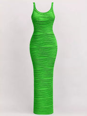 Bright green sleeveless bodycon maxi dress with wavy textured fabric displayed flat