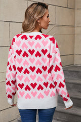 Suéter de cuello redondo con corazón en contraste y alas de ángel