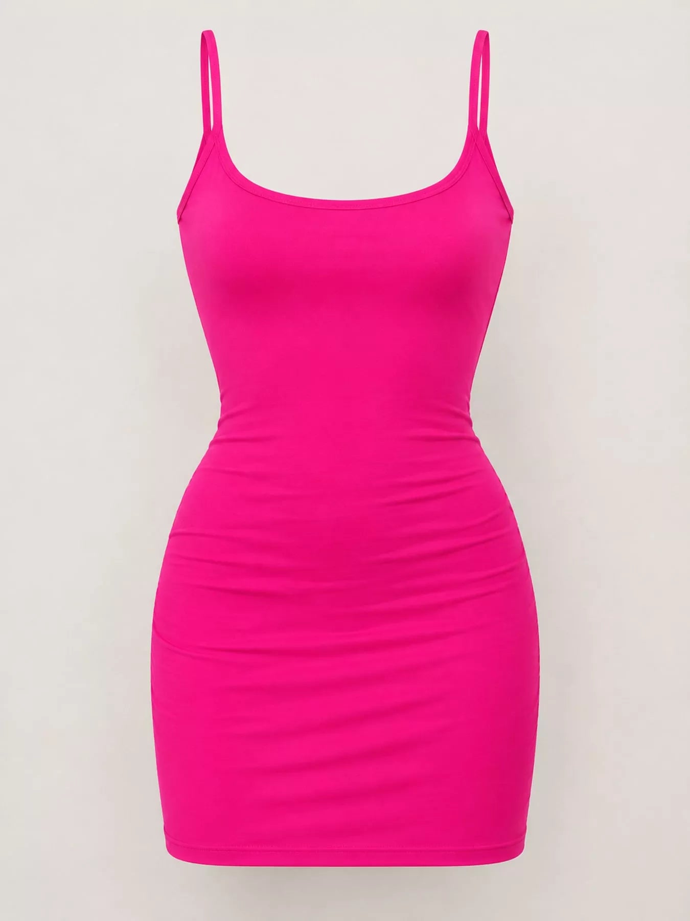 Hot pink scoop neck cami dress with thin straps, flat front view on plain background