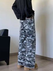 Back view of men's grey camouflage wide leg jeans showing the back pocket and frayed raw hems.