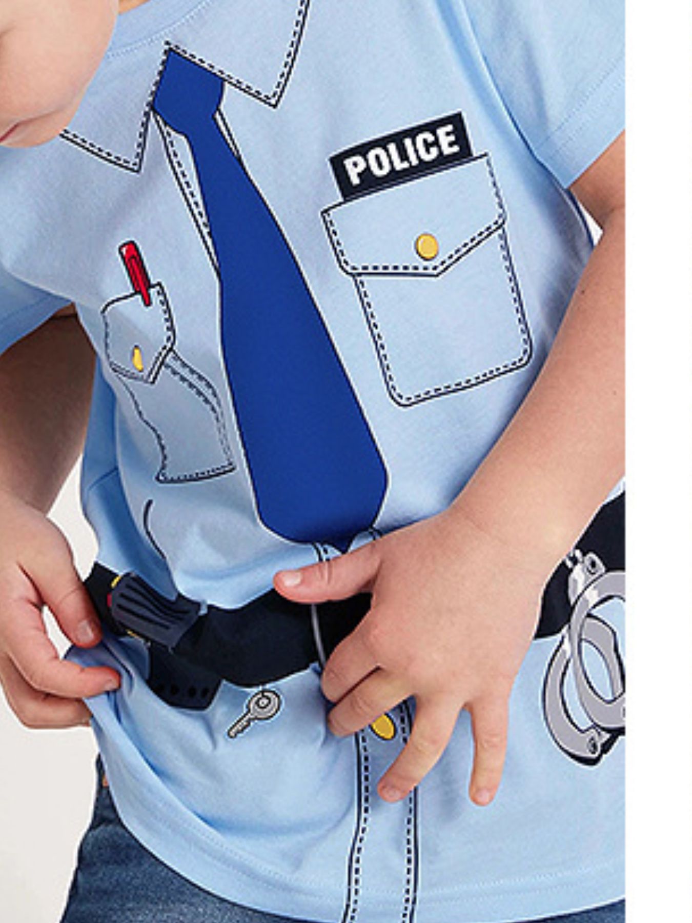 Close front view of a light blue children's police uniform tee showing tie and chest pockets