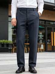Men's navy dress pants with a classic fit and pockets.
