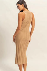 Back view of a taupe round neck bodycon ribbed knit dress worn on model