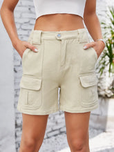 Women's washed high-waisted denim shorts with pockets in a non-stretch rayon blend.