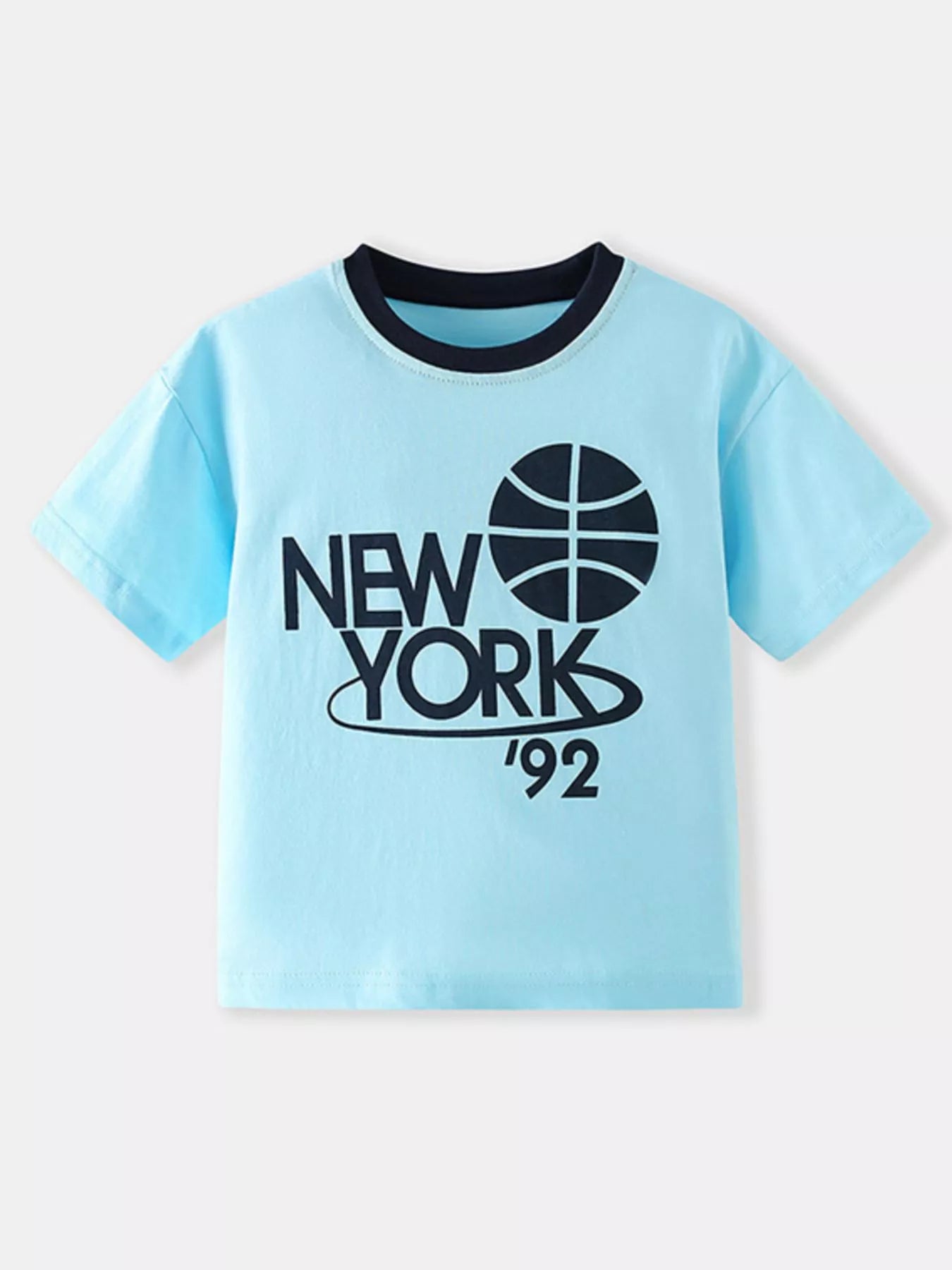 Front view of the pastel blue children's casual t-shirt with dark navy NEW YORK basketball graphic and contrast neckline