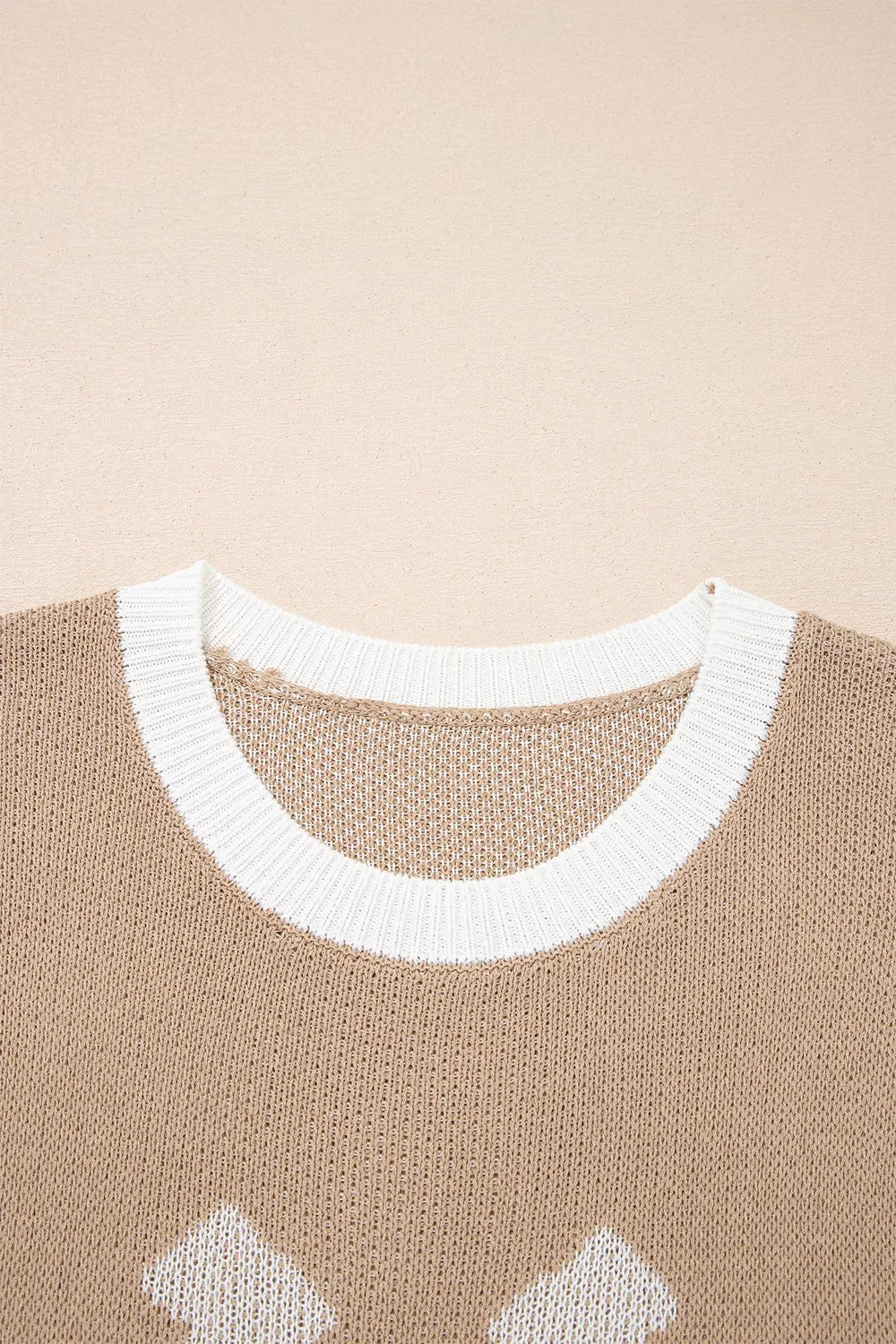 Close-up of the mocha sweater front neckline with white ribbed trim