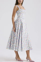 Women's floral midi dress with a square neckline, wide straps and ruched detailing.