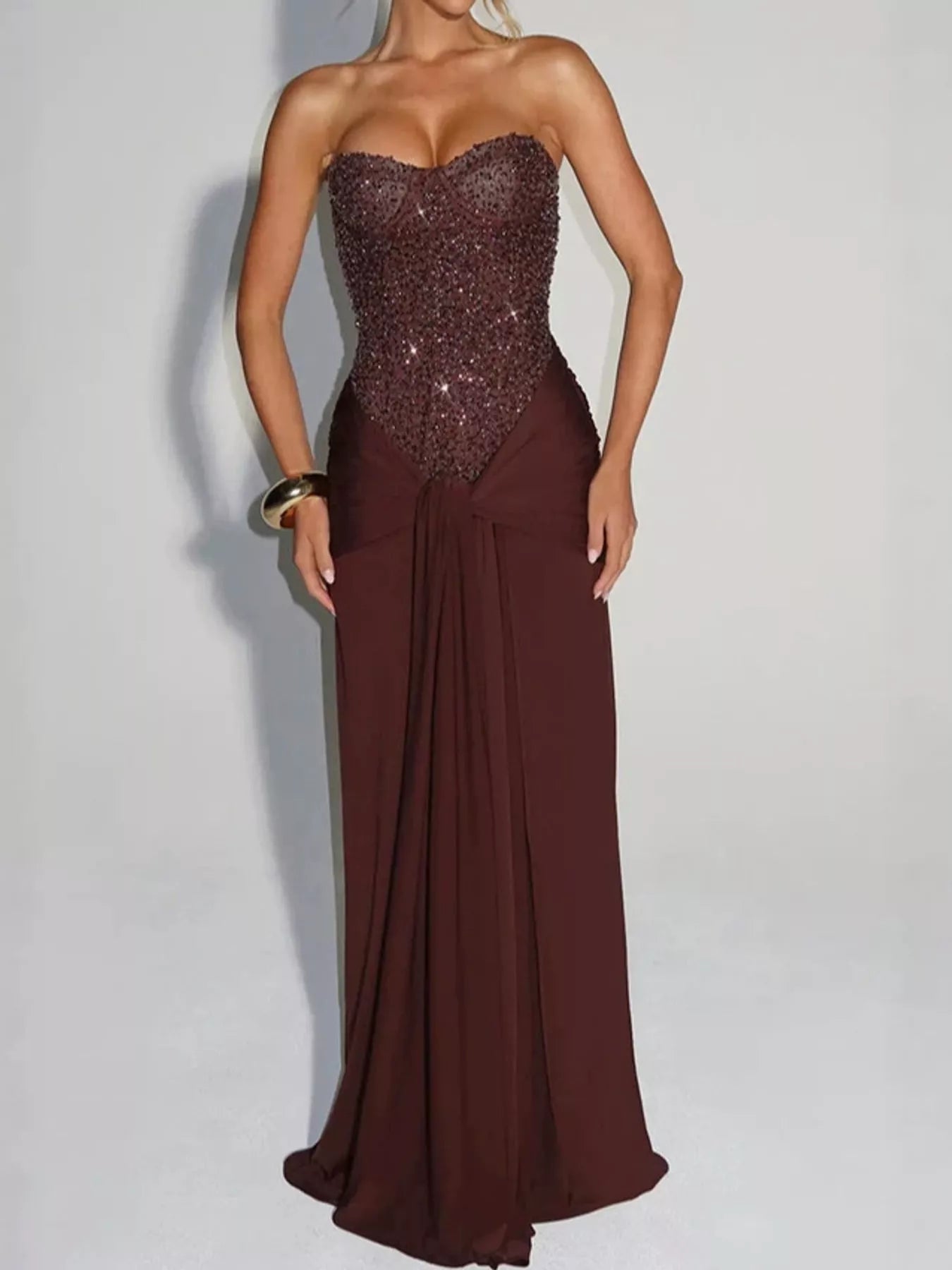 Dark Brown strapless sequin corset maxi dress with draped waist on model, studio front view