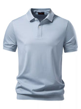 Men's classic-fit short-sleeve polo in a rayon, nylon, and elastane blend.