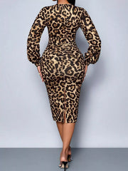 Back full view of leopard print bodycon midi dress with ruched waist and back slit