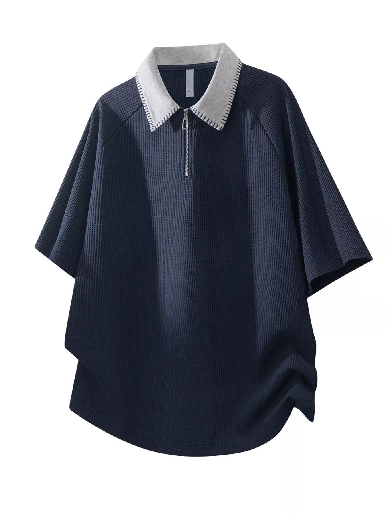 Men's waffle-knit polo with a half-zip neckline in a cotton-spandex blend.