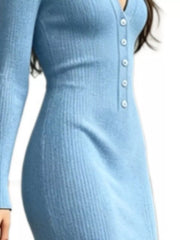 Close up of light blue ribbed sweater dress bodice with V neckline and front buttons
