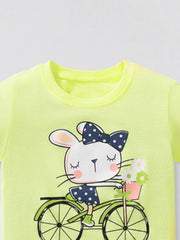 Upper front view showing the round neckline and rabbit bicycle graphic on the yellow green t-shirt