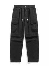 Men's relaxed fit cargo pants with a drawstring waist and pockets.