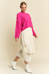 Suéter con hombros caídos y estampado de rombos de Davi & Dani