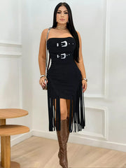 Black strapless bodycon dress with silver buckles and long fringe hem, front view on model