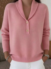 On-model front view of a pink shawl collar sweater with cream buttons