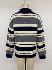 Back view of the striped polo sweater displayed on a mannequin