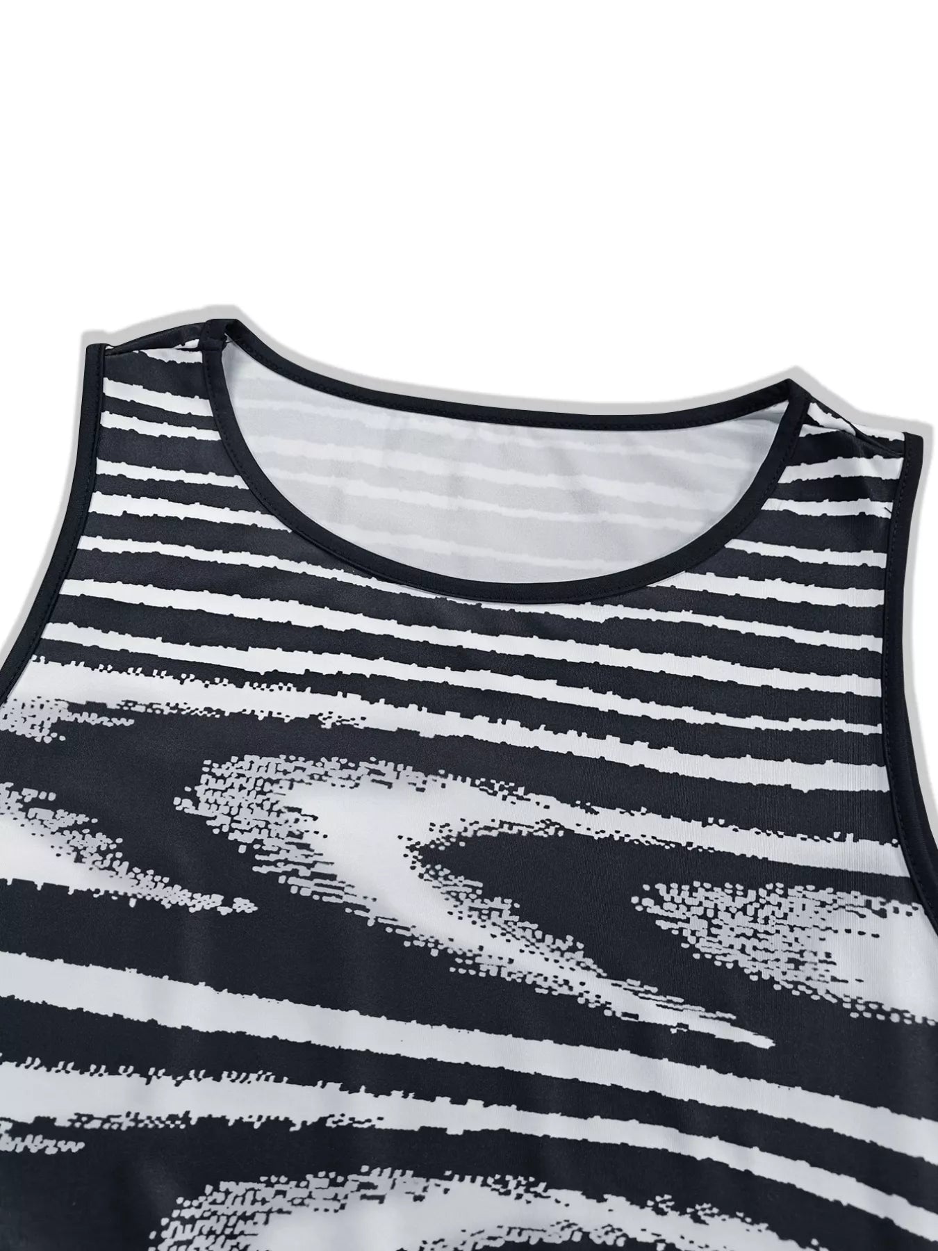 Close view of the neckline and striped bodice on a black and white sleeveless bodycon maxi dress