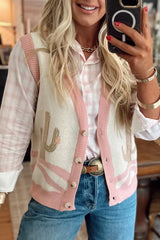 Mirror selfie front view of the cream cactus sweater vest with pink trim over a pink check shirt