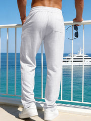 Men's casual striped pants with a drawstring waist and pockets.