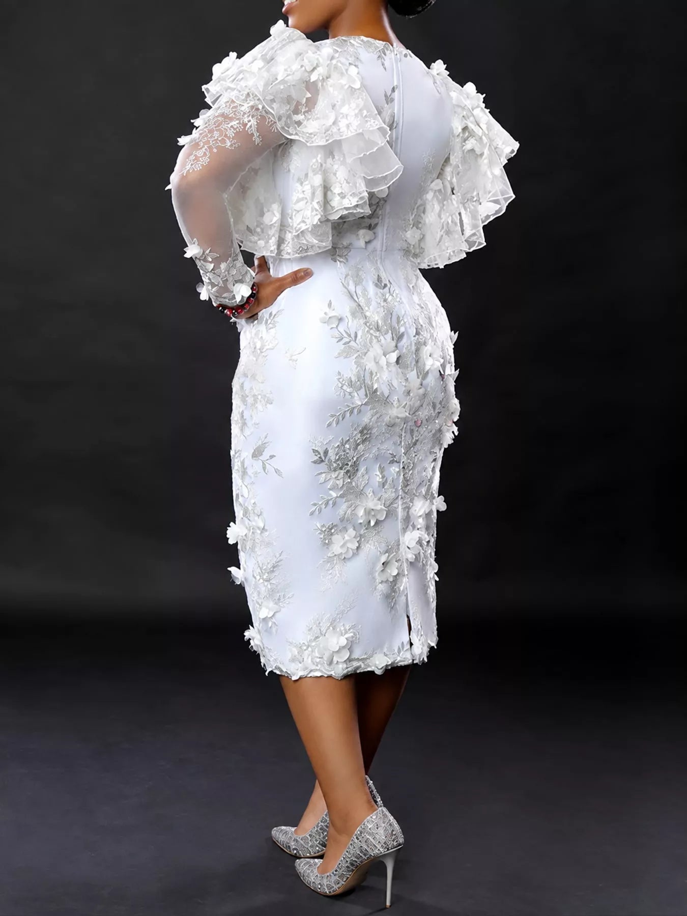 Back side view of white plus size floral embroidered sheer ruffle sleeve midi dress