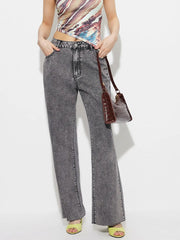 Women's dark gray high-waisted bootcut jeans with button fastening and pockets.