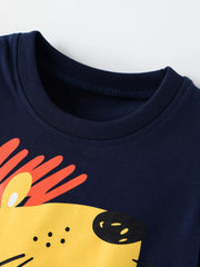 Close up of the dark blue round neckline and the top of the yellow lion graphic