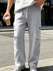 Men's light gray cargo pants with a drawstring waist and pockets.