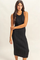 Black sleeveless ribbed knit bodycon dress with round neck, front view with arms crossed