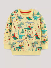 Flat lay front view of yellow children's long sleeve sweatshirt with festive dinosaur and Christmas tree print