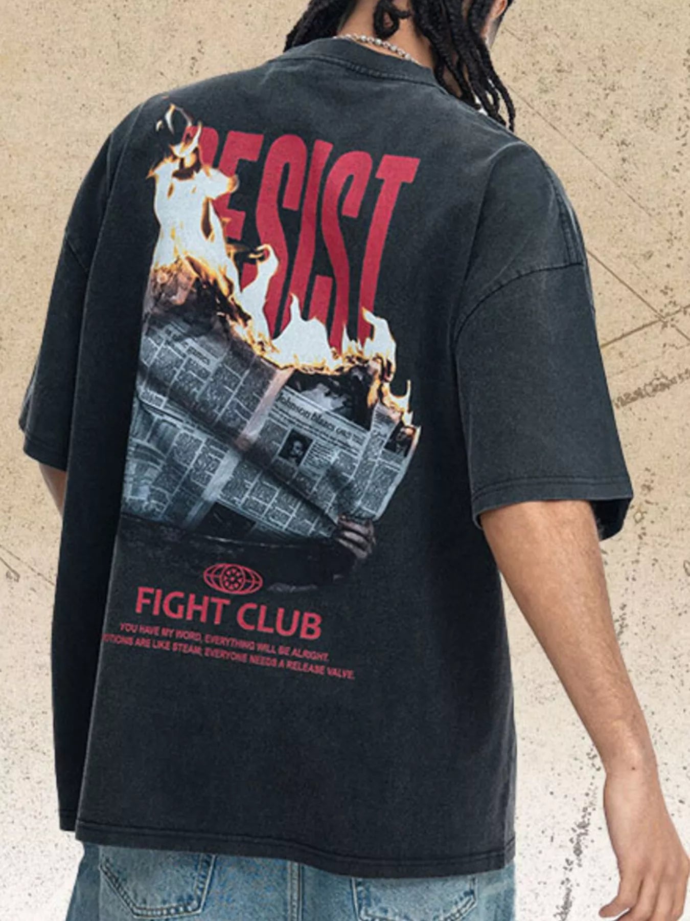 Men's vintage-style graphic T-shirt with a round neckline and back-print design.
