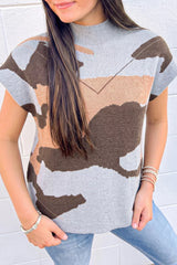 Front view of a gray, brown, and tan camouflage knit top with high neck.