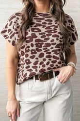 Front view of a loose brown leopard print knit top with short sleeves.
